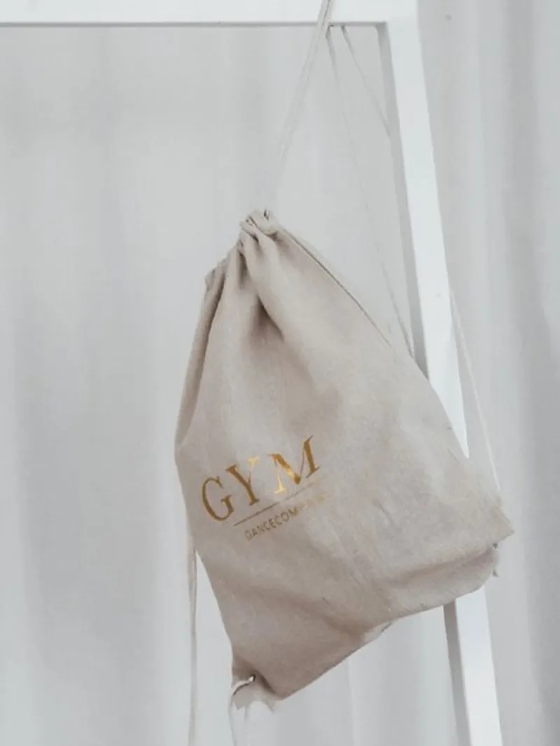 Dansebutikken Andet Til Gymnastik-Hør rygsæk/mulepose med guld GYM skrift